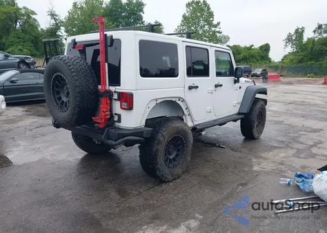 2014 Jeep Wrangler Unlimited Rubicon из США, поврежденный, VIN 1C4HJWFG4EL104827